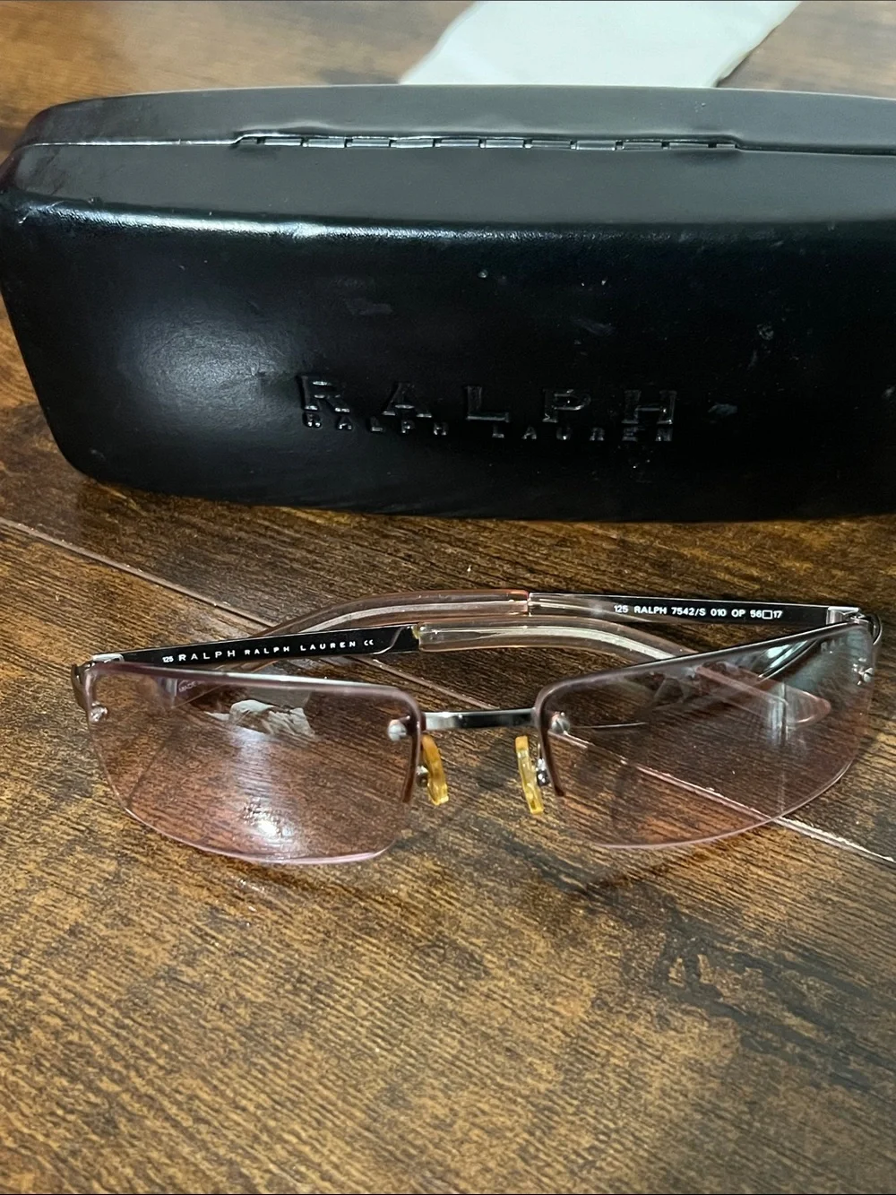 Ralph Lauren women’s Brown-Tinted Rimless Sunglasses pink